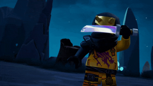 a lego ninja holding a sword with a dragon on it