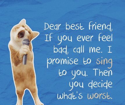 a cat singing into a microphone with a blue background