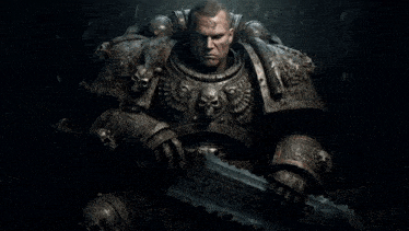 a man with skulls on his armor holds a large sword that says ' emperor ' on it