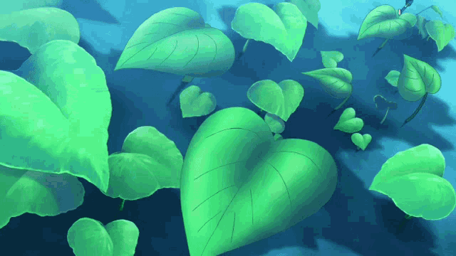 a bunch of green heart shaped leaves are floating in the air