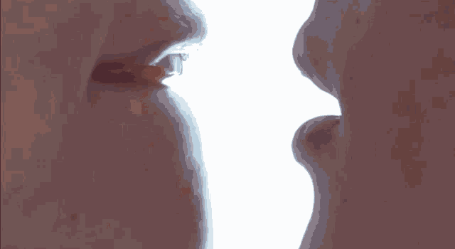a close up of a person 's mouth with a white background .