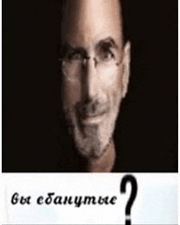 a close up of a man 's face with glasses and a question mark in the corner .