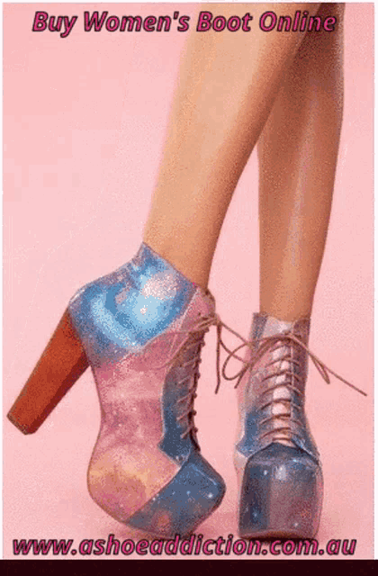 a picture of a woman 's feet wearing a pair of pink and blue galaxy boots