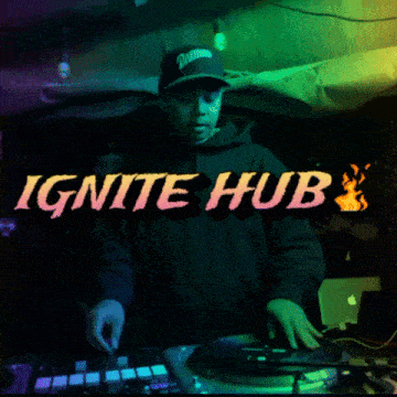 a man playing a record with the words ignite hub behind him