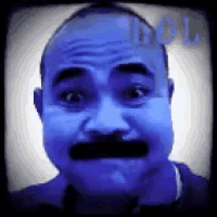 a close up of a man 's face with a mustache and a blue background .