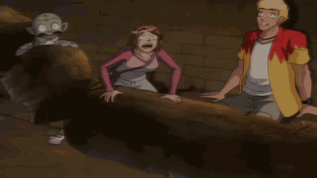 a man in a yellow shirt is standing next to a woman in a pink shirt and a man in a green helmet