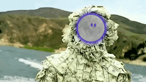 a man in a camouflage suit made of money with a smiley face on his face is standing in front of a body of water .