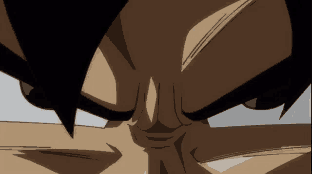 a close up of a cartoon character 's face with a very angry look on his face