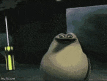 a cartoon penguin is standing next to a screwdriver and smiling .