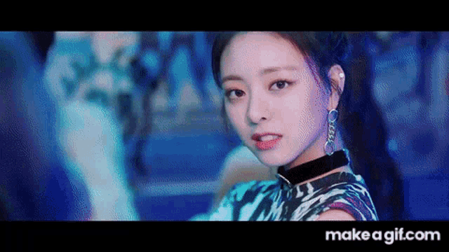 a close up of a woman wearing a choker and earrings