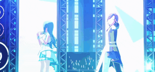 a man and a woman are standing next to each other on a stage in a video game .