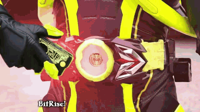 a person is wearing a belt that says bit rise