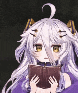 a girl with purple hair is reading a book
