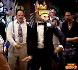 a man in a tuxedo stands in front of a rare donkz poster