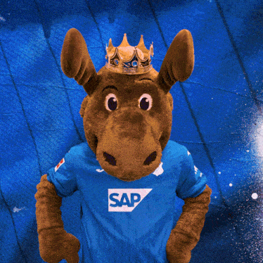 a stuffed animal wearing a blue shirt with the word sap on it
