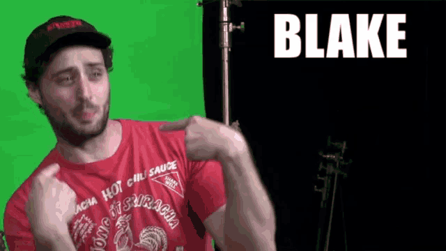 a man wearing a shirt that says blake on it