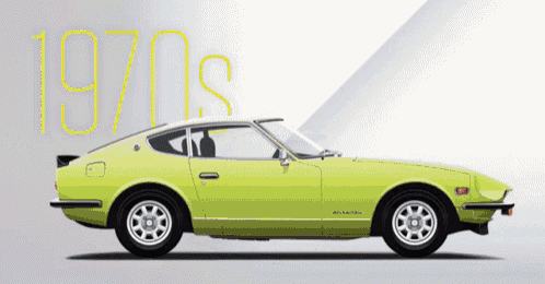 a green sports car from the 1970 's is shown