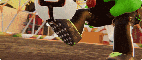a close up of a cartoon character 's feet with the letter t on the bottom
