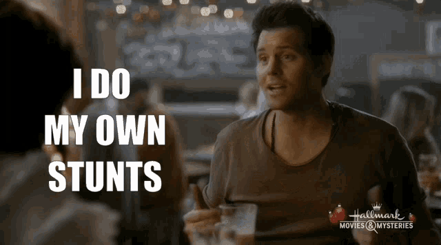a man says i do my own stunts while holding a glass of beer
