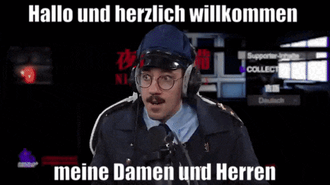 a man with glasses and a mustache is wearing headphones and says hallo and herzlich willkommen meine damen und herren