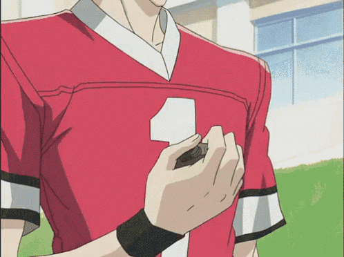 a man in a red shirt with the number 1 on it