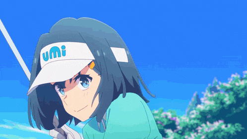 a girl wearing a white hat with umi on it