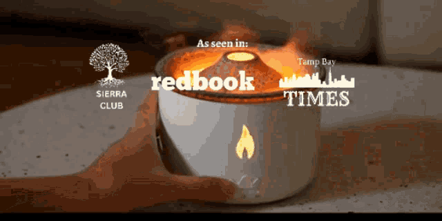 a person is holding a white container with the words redbook times on it