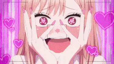 a girl with hearts in her eyes making a funny face