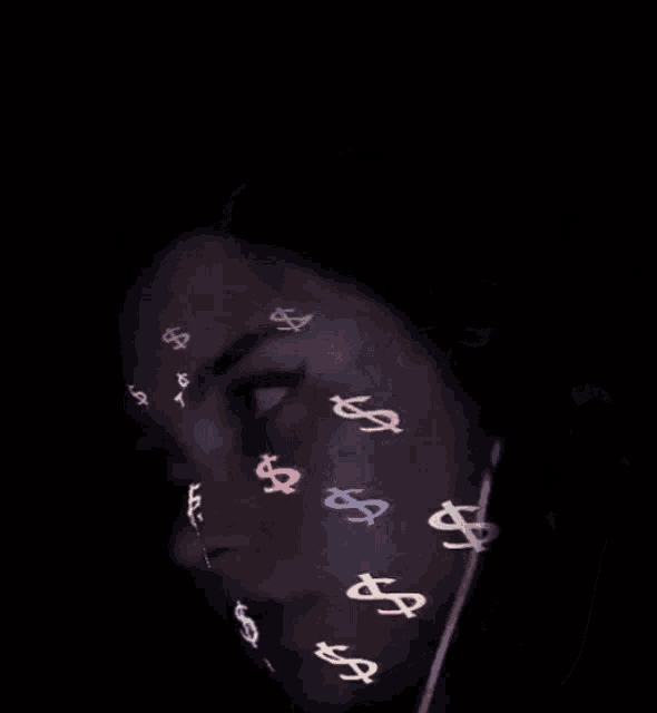 a woman with dollar signs on her face and ear buds