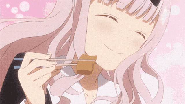 a cartoon girl is eating something with chopsticks and smiling