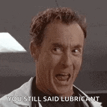 a man in a lab coat is smiling while saying `` you still said lubricant '' .