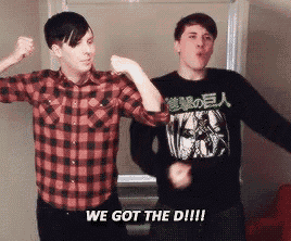 two men are dancing and one of them is wearing a shirt that says ' we got the di !!! '