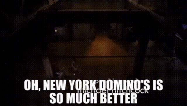 a black and white photo of a building with the words `` oh , new york domino 's is so much better ''