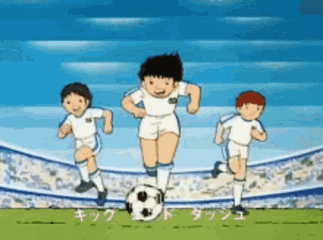 a group of boys are playing soccer on a field with a soccer ball .