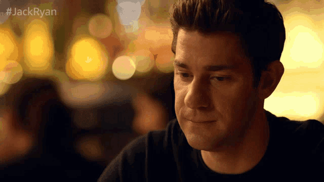 a close up of a man 's face with #jackryan written in the corner
