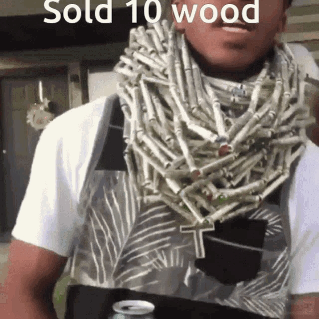 a man wearing a scarf made out of money with the words sold 10 wood written on the bottom