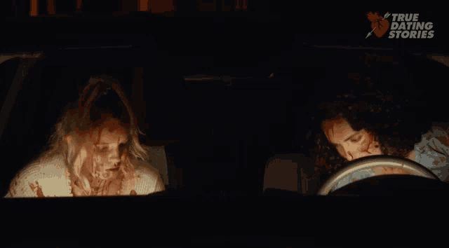 two women are in a car with blood on their faces and the words true dating storm on the bottom