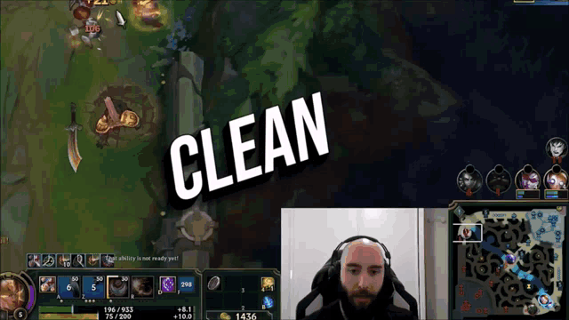 a man wearing headphones is playing a video game with the words clean above him