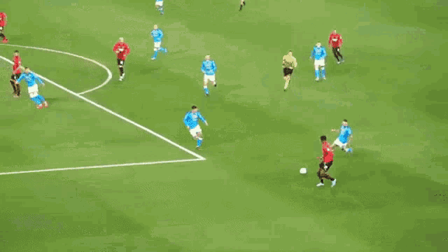 a group of soccer players are playing a game on a field and one player has the number 17 on his shirt