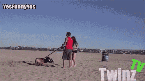a woman standing next to a man in the sand with the words yesfunny yes twinz