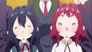 a group of anime characters with one girl with red hair