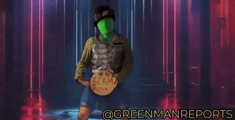 a green man holding a sign that says $ cam coin