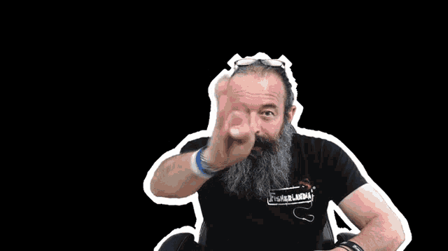 a man with a beard is wearing a black shirt that says thunderdome on it