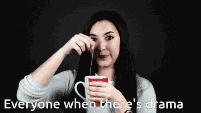 a woman pouring something into a cup with the words everyone when there 's drama