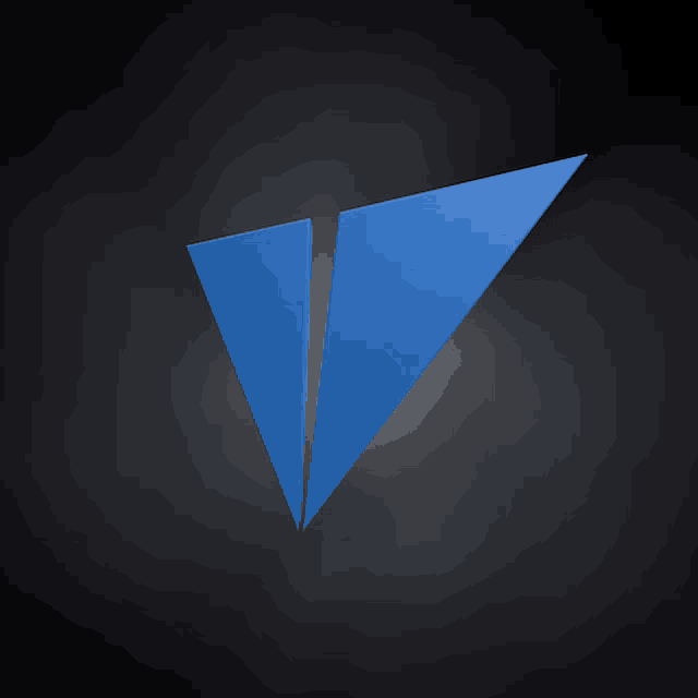 a blue triangle on a black background with a white outline