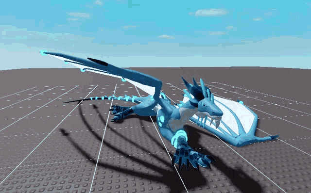 a blue and white dragon laying on a grid