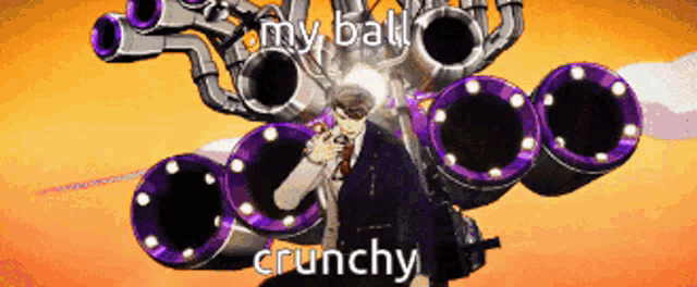 a man in a suit is standing in front of a machine that says my ball crunchy on it