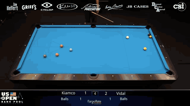 a pool table with the us open bank pool championship on the screen