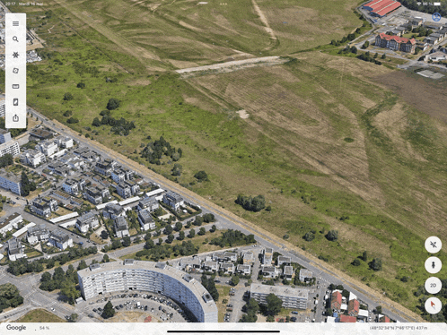 an aerial view of a city with a google map open