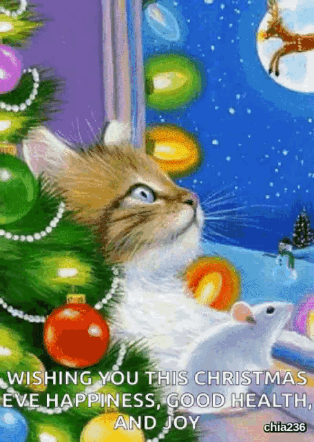 a cat is looking up at a christmas tree while a mouse sits under it .